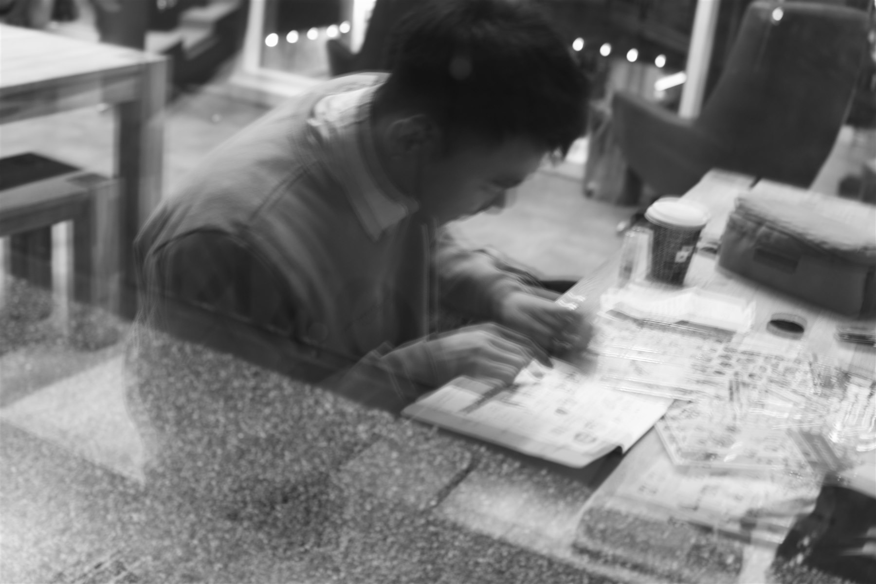 A candid black-and-white portrait of Kiran.